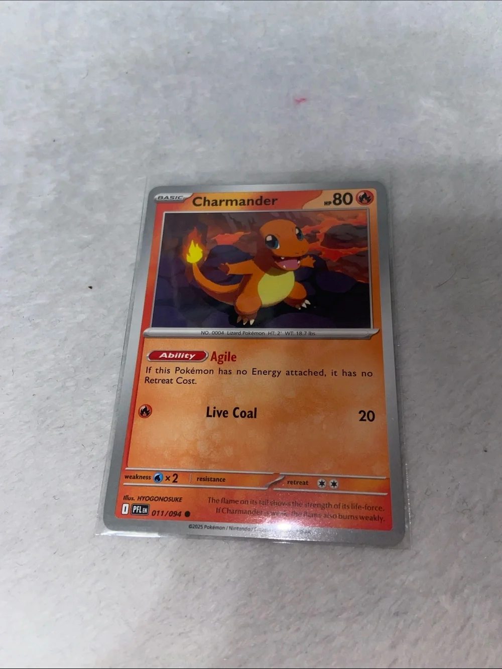 Charmander #011/094 ME02: Phantasmal Flames (PFL)